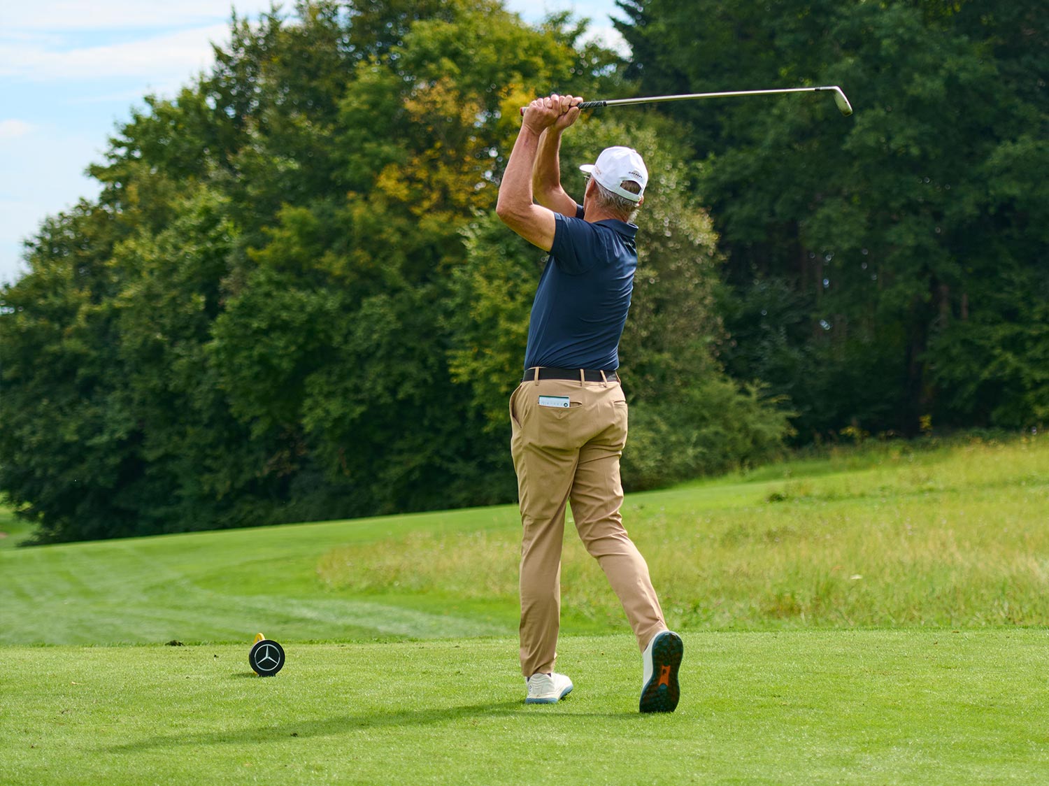 Golfspieler Golfspieler beim Abschlag